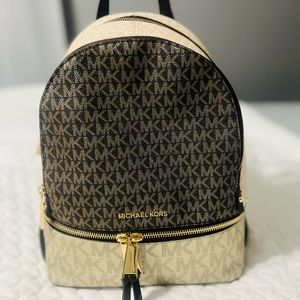 Michael Kors backpack purse. Barely used, like new.
